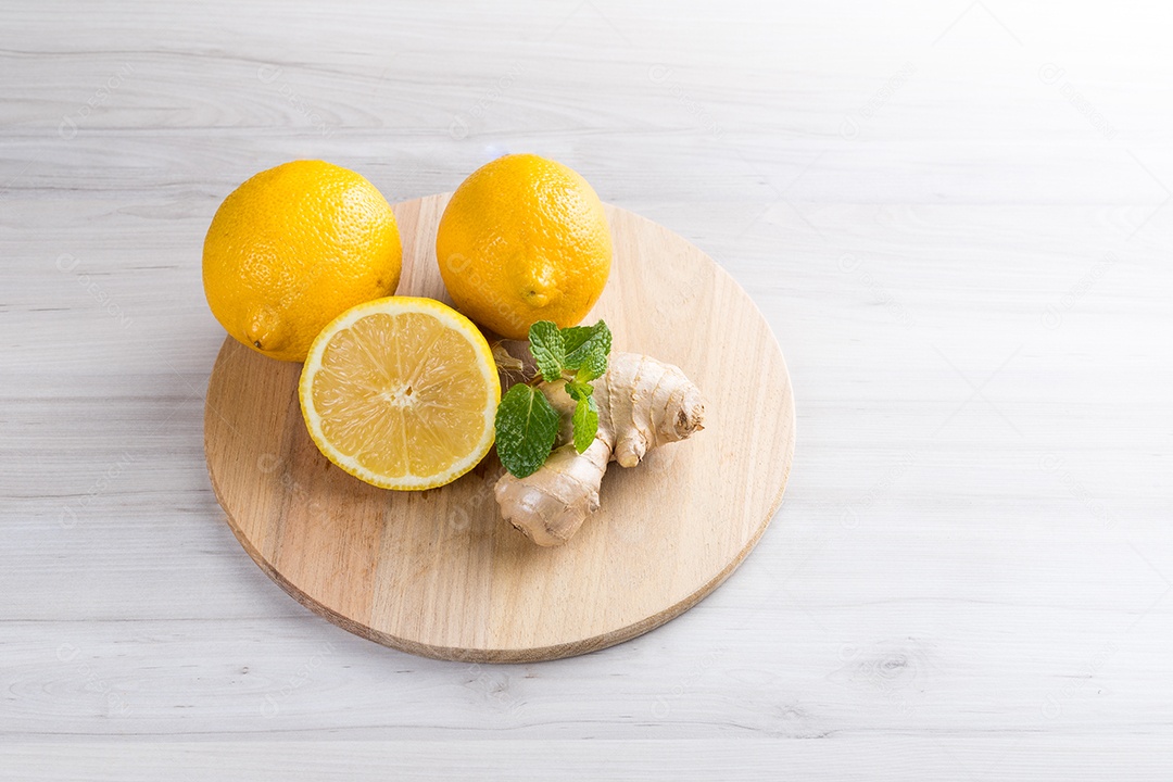 Sicilian Lemons and Ginger On A White Wooden Table