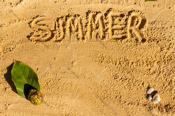 Verão Escrito na Areia da Praia