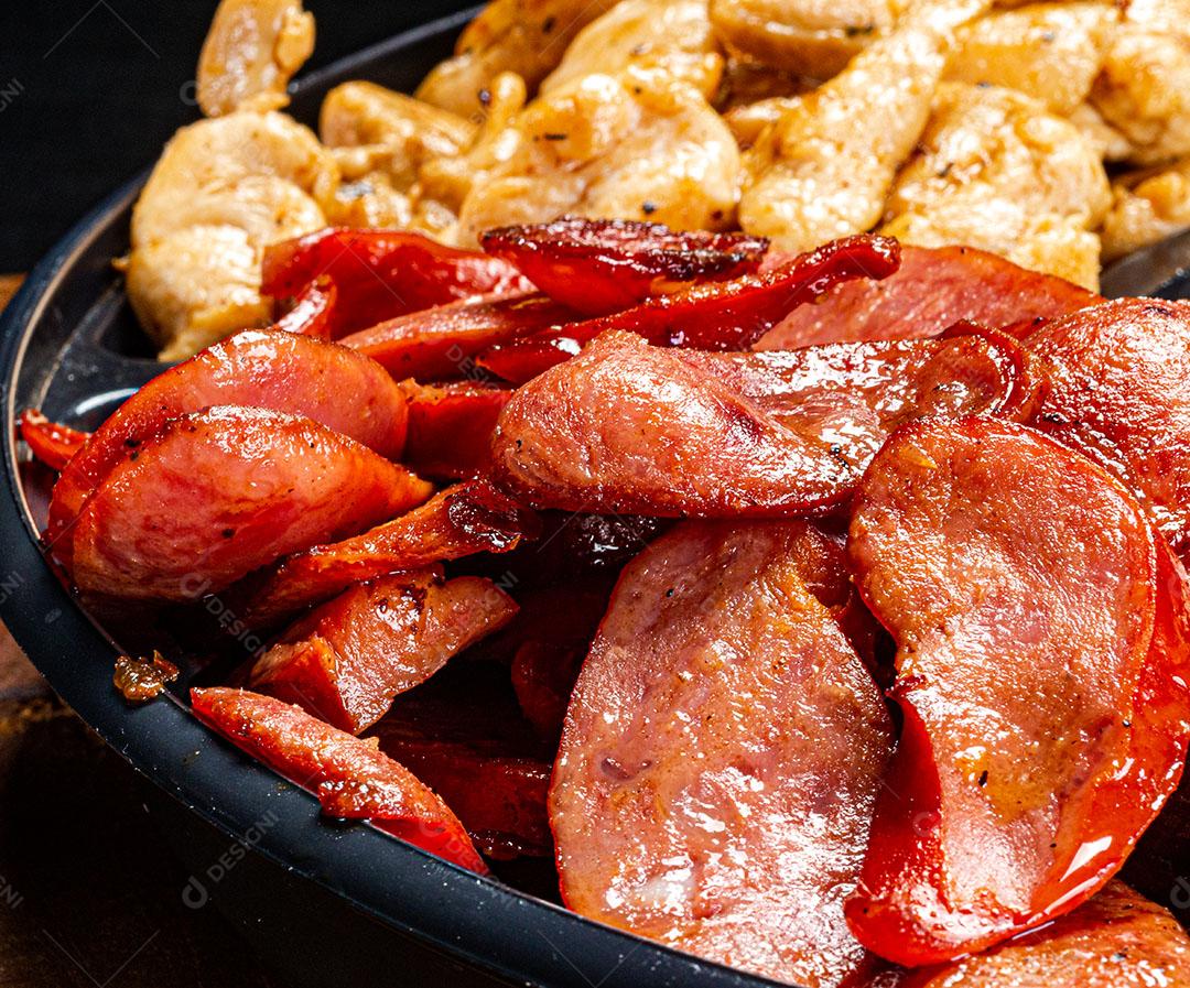 Foto Calebresa Portion and Fried Chicken Typical Food Imagem JPG