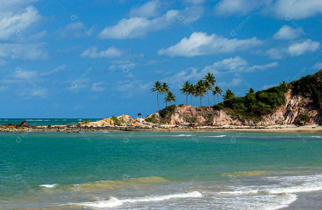 Foto Praia Com Águas Azuis Lindas Paisagem Imagem JPG