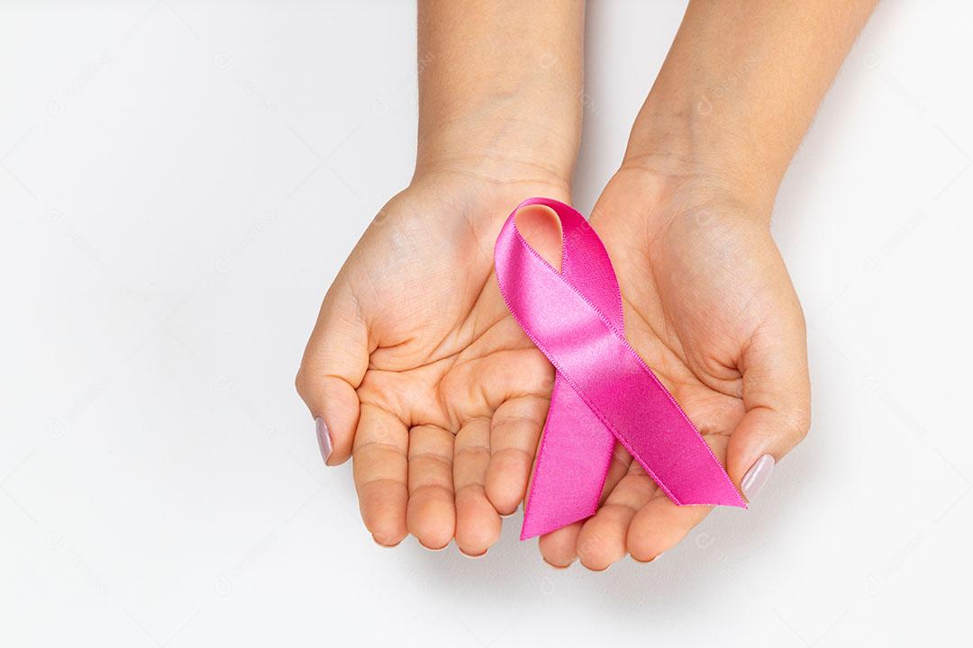 Hands Holding Pink Ribbon Breast Cancer Prevention