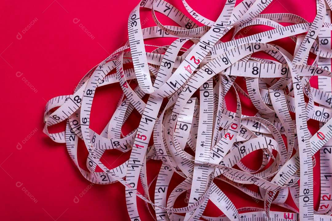 Foto Fita Métrica Academia Com Fundo Vermelho Imagem JPG