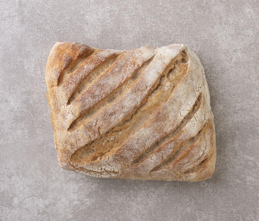 Pão Integral Sobre Fundo de Concreto Vista do Topo Imagem JPG