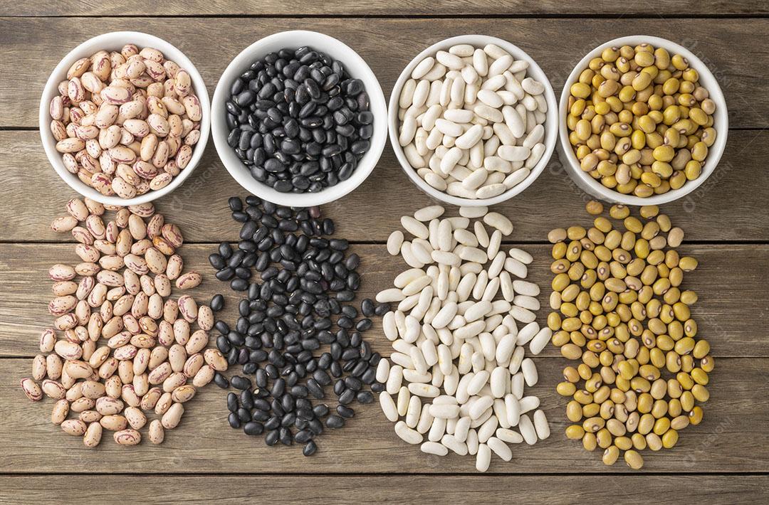 Assorted Beans In White Bowls On Wooden Table Image JPG