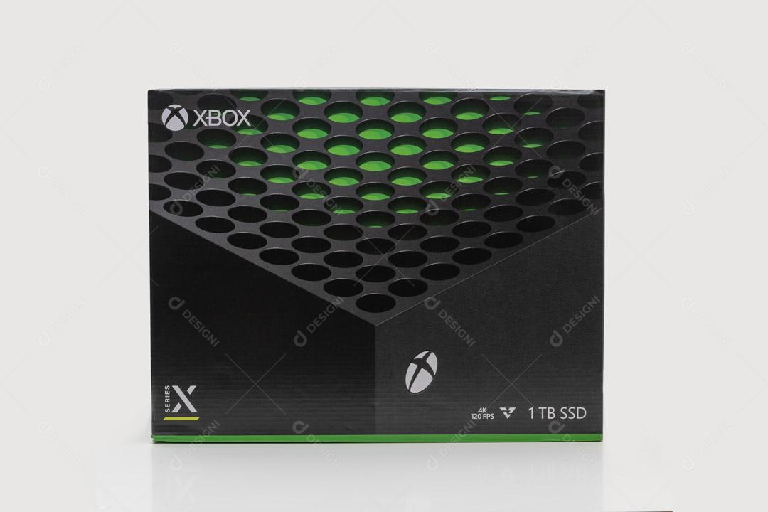 Novo Console de Jogos Preto Em Um Fundo Preto Imagem JPG