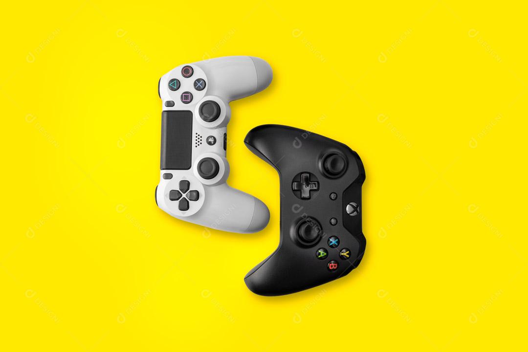 Controladores de Consoles de Jogos Branco Preto Em Um Fundo Amarelo Imagem JPG