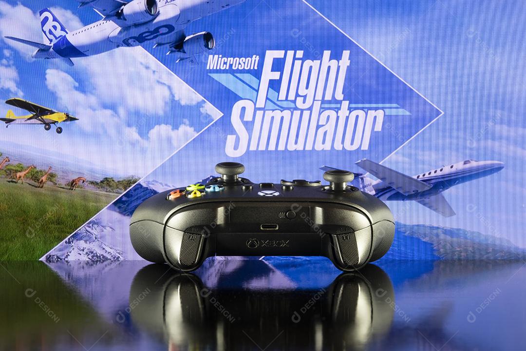 Controle do Xbox Com o Logotipo do Flight Simulator na Tela da Tv Imagem JPG