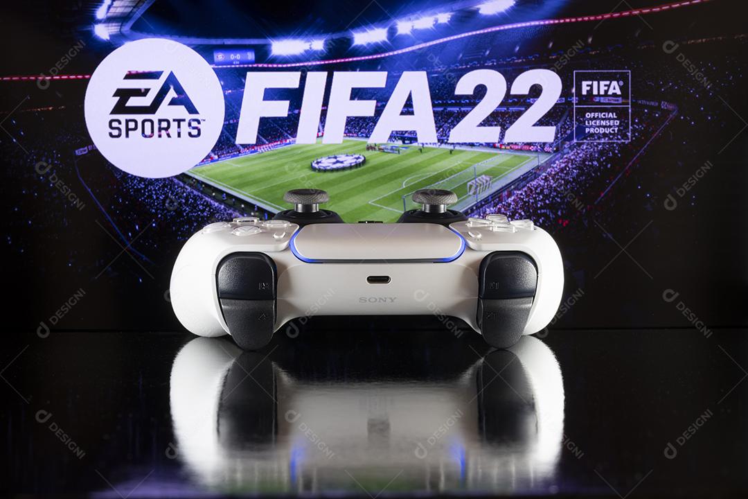 Controle do Xbox Com o Logotipo do Fifa 22 Ao Fundo Imagem JPG