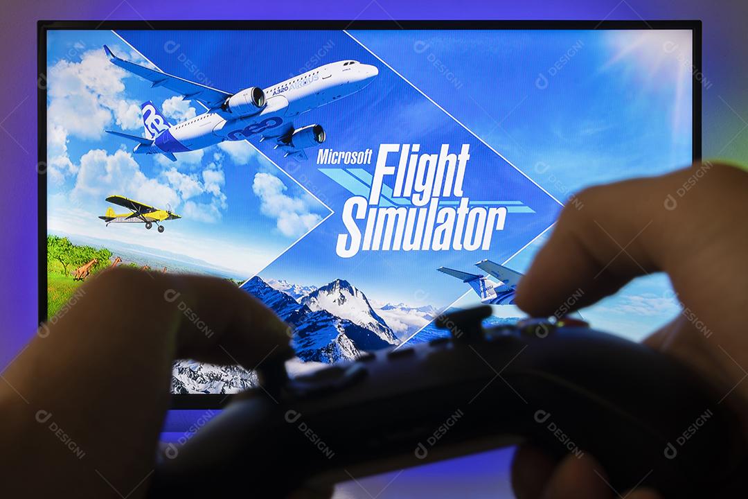 Controle do Xbox Com o Logotipo do Flight Simulator na Tela da Tv Imagem JPG