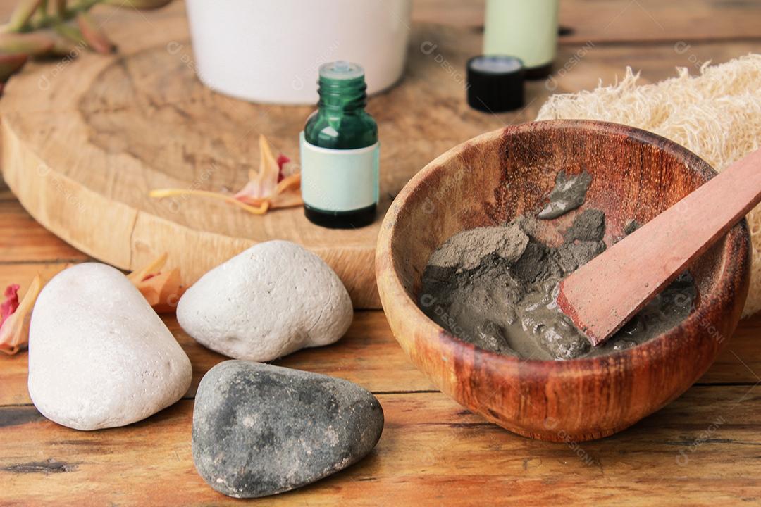 Frasco de Vidro e Tigela Contendo Argila Máscara Facial Imagem JPG