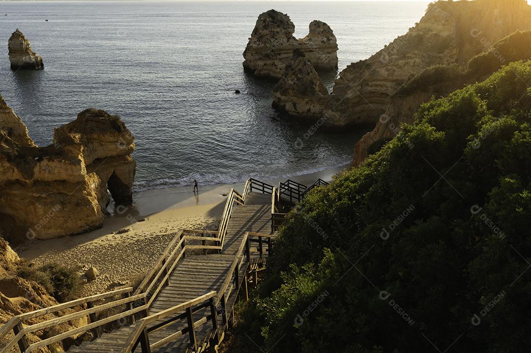 Praia Do Camilo Ao Nascer Do Sol Imagem JPG