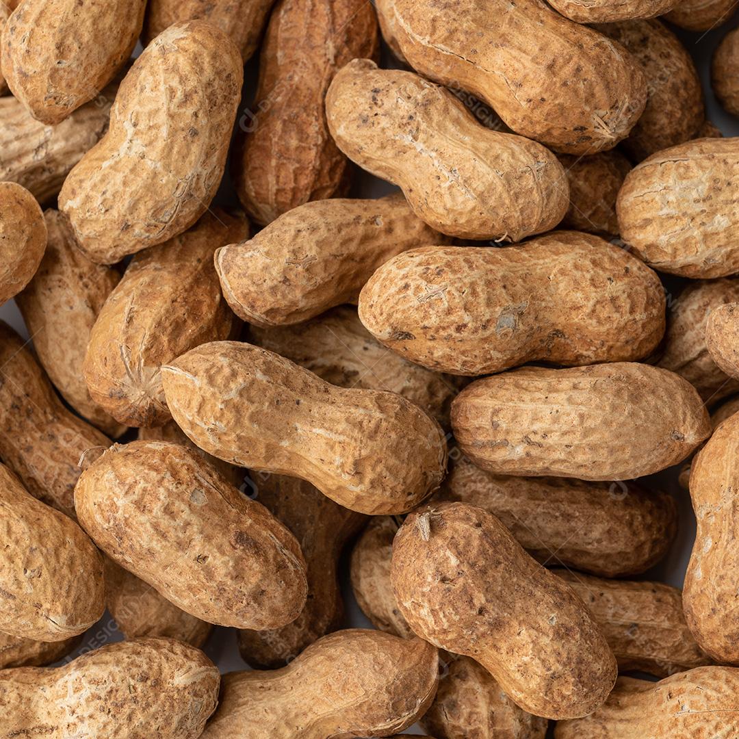 vista superior de amendoins com casca. Pano de fundo alimentar JPG