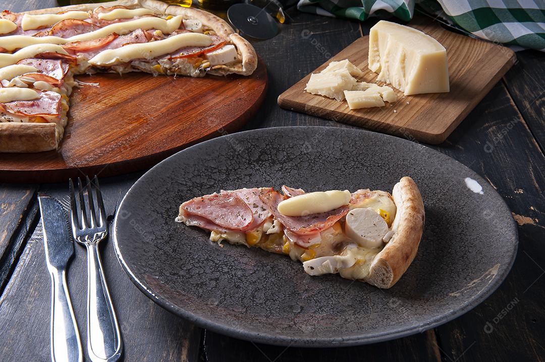 A Piece of Brazilian-style Tenderloin Pizza with Mozzarella, Palm Hearts JPG