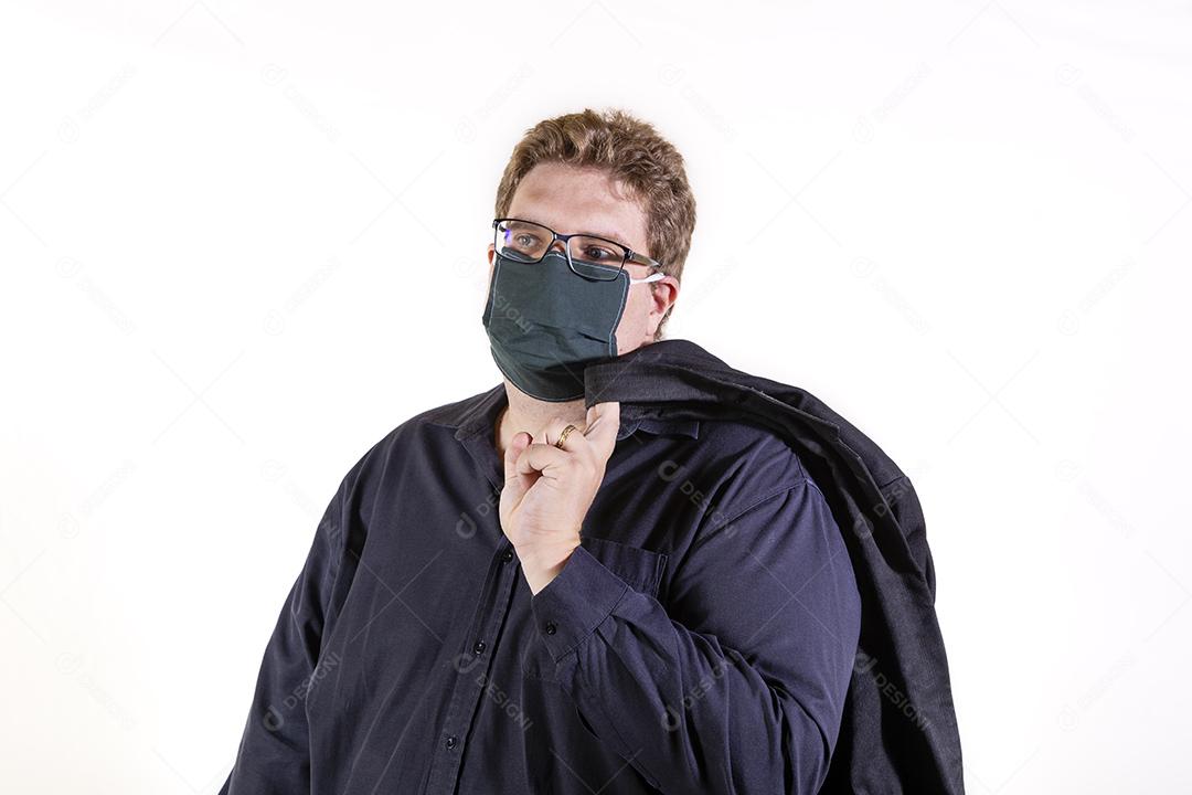 Photos Blonde man wearing glasses with a homemade mask for protection against covid