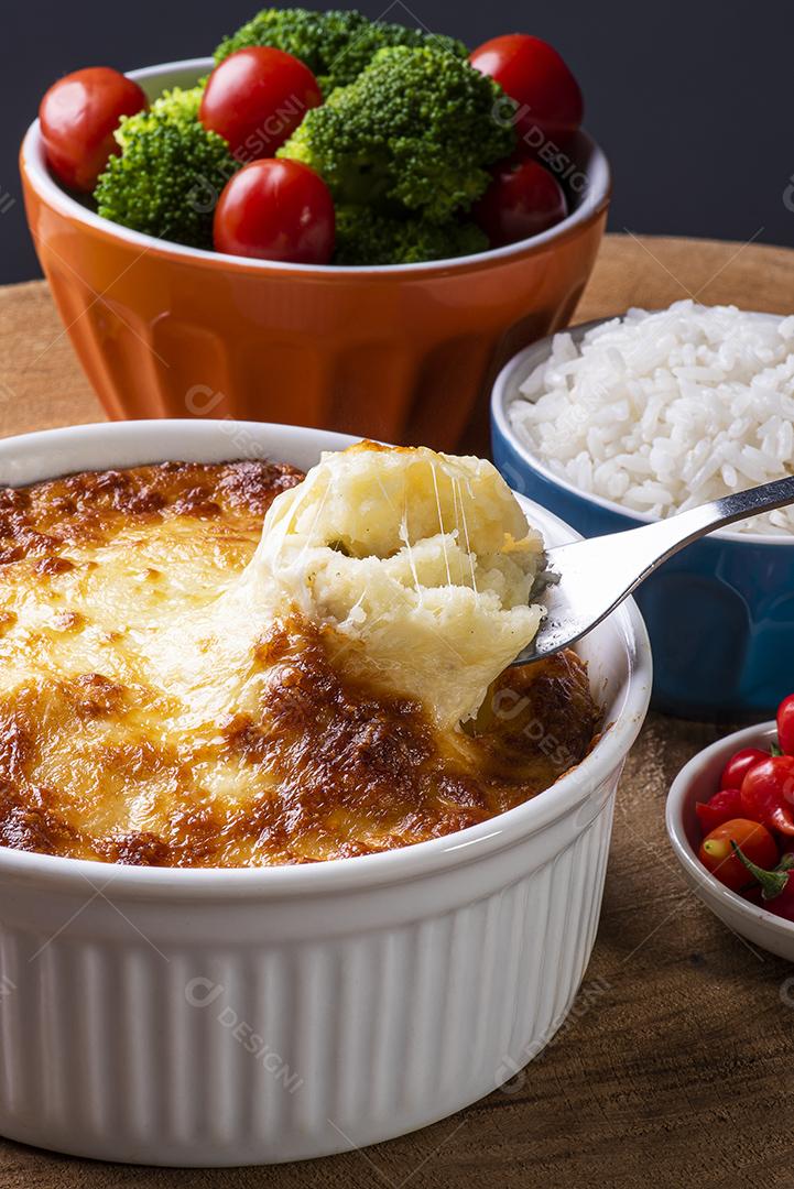 The Escondidinho. Typical Brazilian food. Made from Potatoes JPG