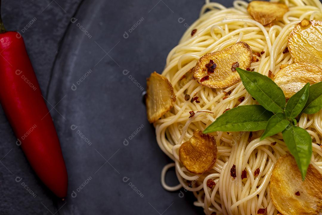 Spaghetti pasta with fried garlic and olive oil Image JPG