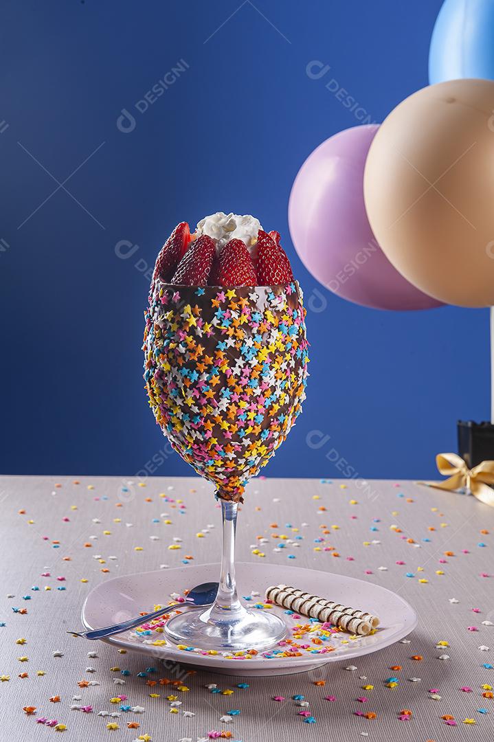 Beautiful bowl of ice cream decorated with whipped strawberries JPG