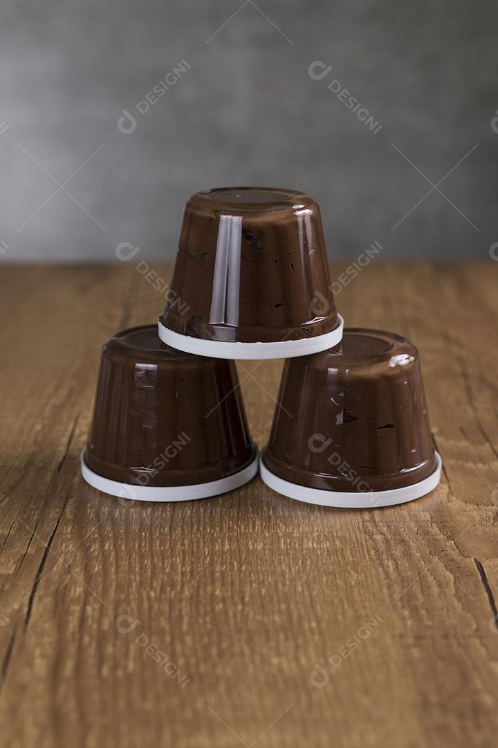 Brazilian chocolate candy called Brigadeiro in pot on wood