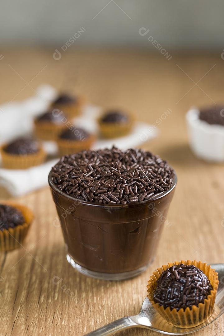 Brazilian chocolate candy called Brigadeiro in pot on wood