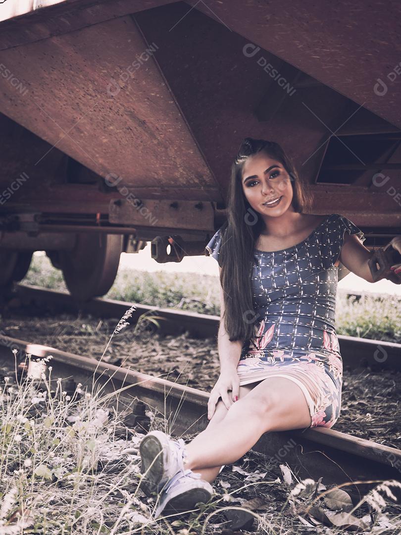 Beautiful brunette girl posing in nature