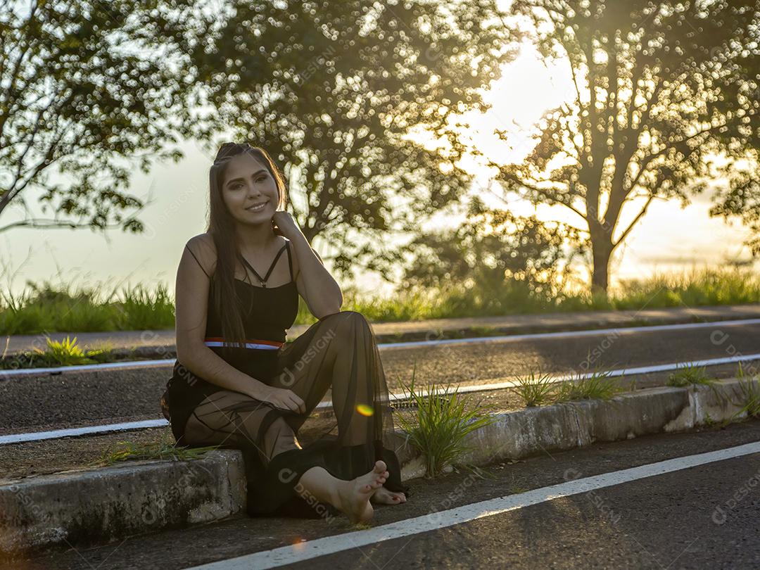 Beautiful brunette girl posing in nature