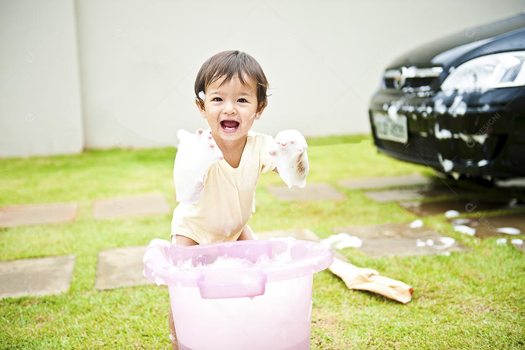 Girl having fun with foam JPG