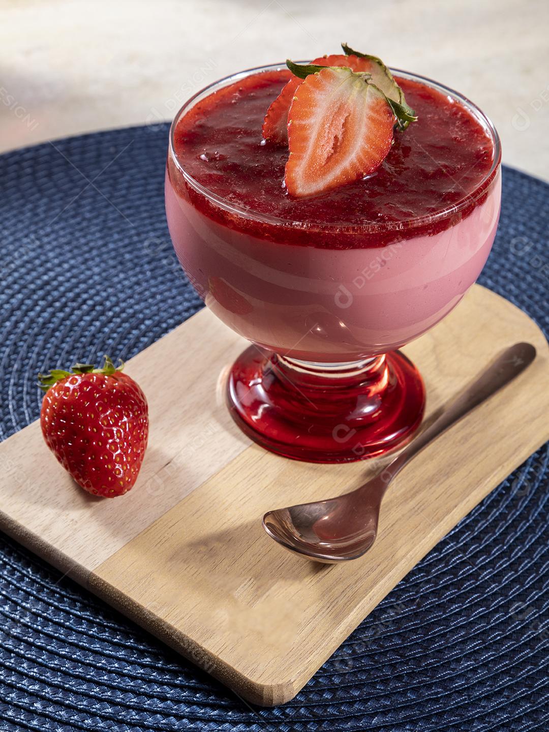 Strawberry mousse in crystal bowl topped with strawberry jam Image JPG