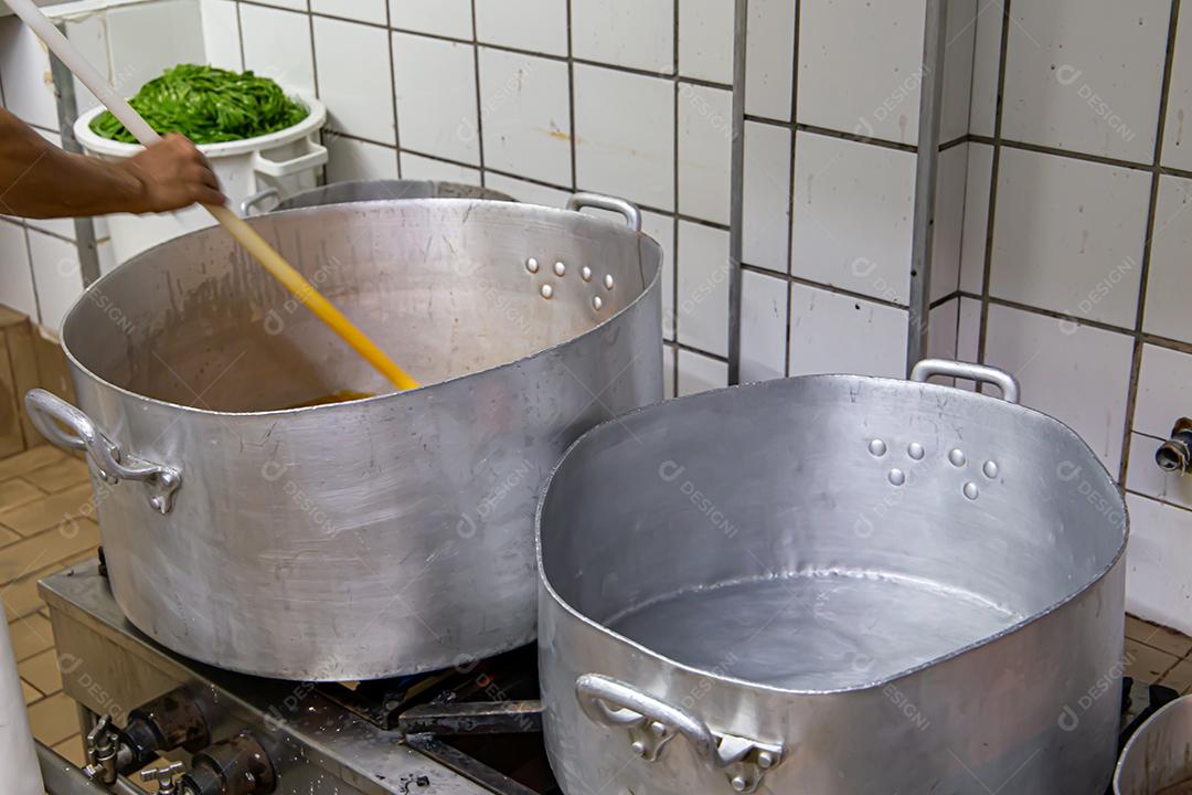 Pot with feijoada, typical Brazilian food. In a restaurant in Brazil JPG
