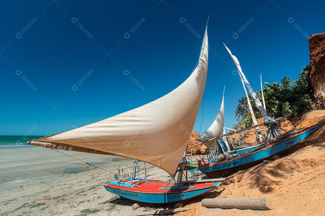 g009 Rafts with open sails on a sunny afternoon at Vila Nova beach, Icapui, Ceara, Brazil on September 6, 2016-2