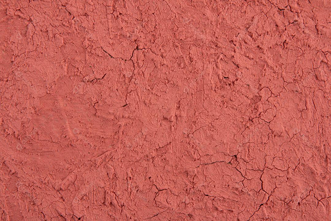 Textura da terra seca pela seca. As rachaduras no chão