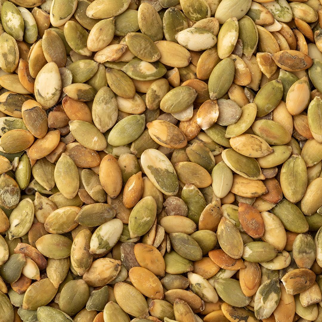 Closeup vista superior de sementes de abóbora. Cenário de comida.