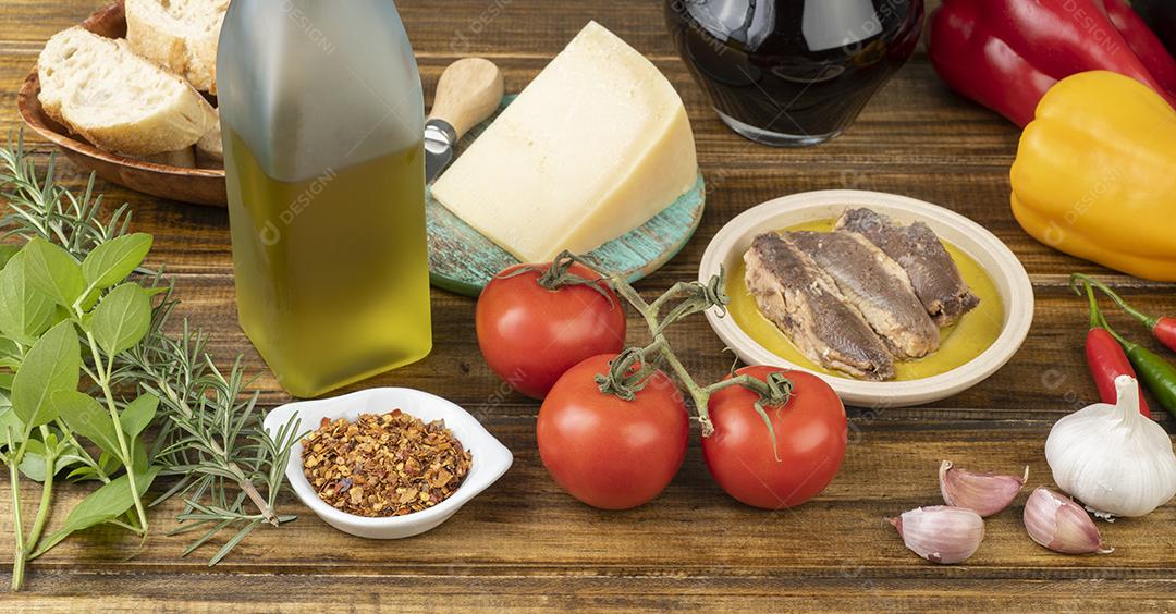 Legumes, azeite, pão, queijo, peixe e vinho e vegetais