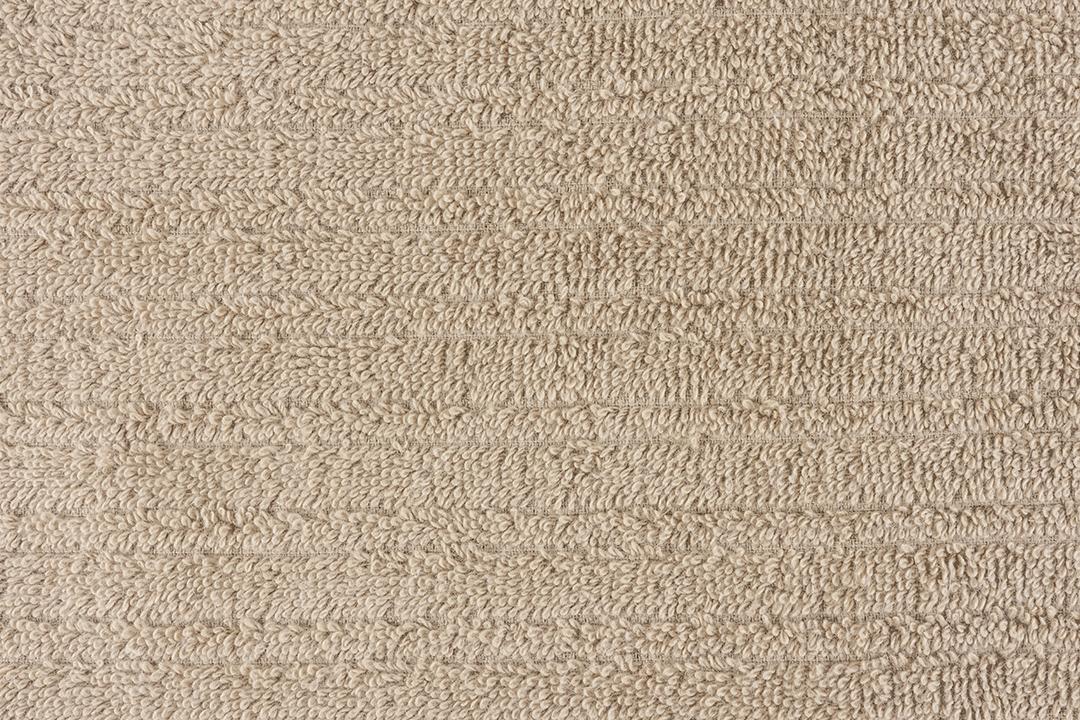 toalha marrom claro. Cenário de detalhes têxteis