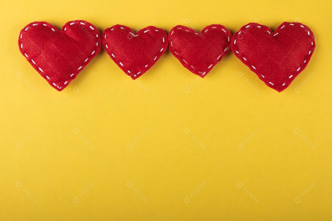 Red hearts on yellow background.