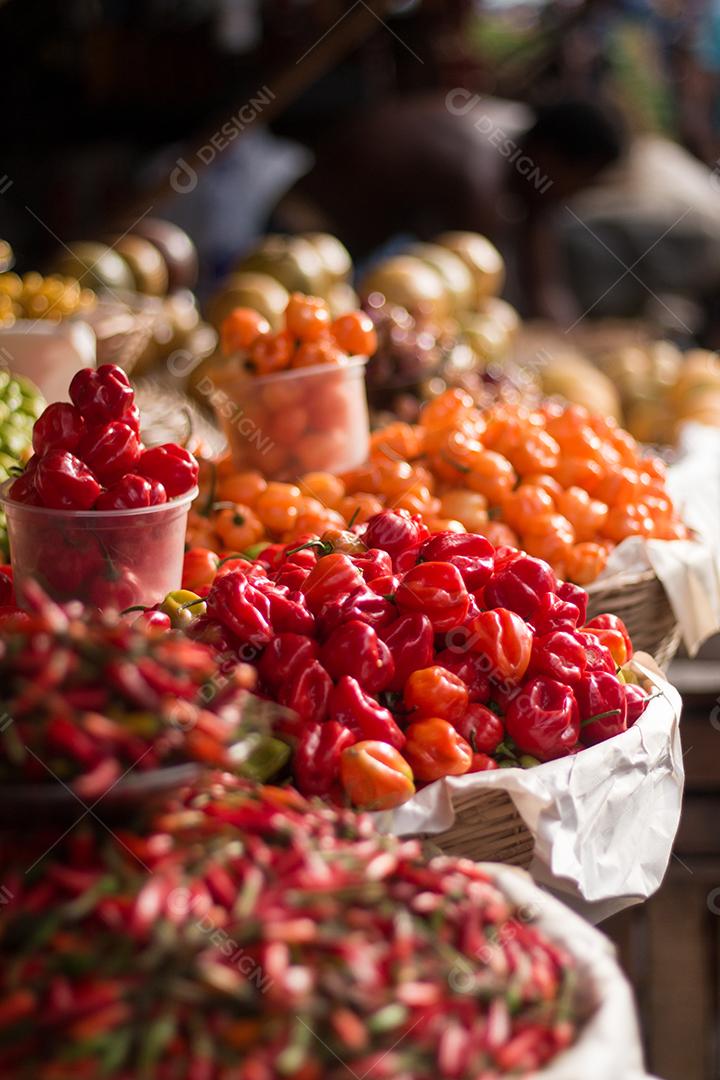 pile of peppers for sale at a popular fair.