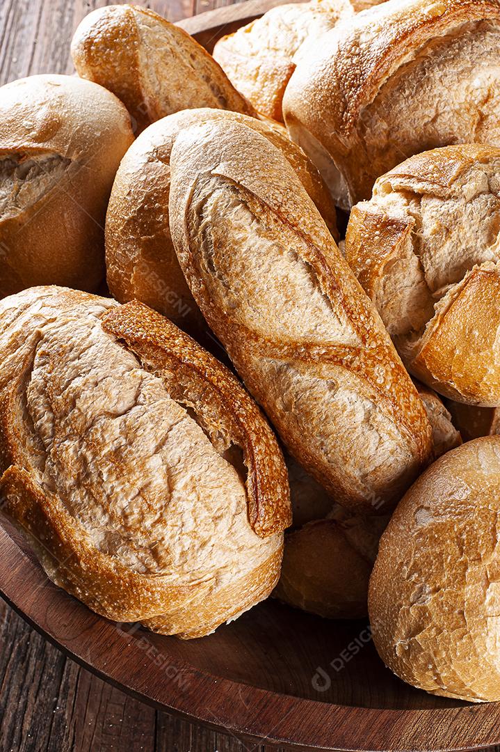 Various types of naturally leavened bread together in a basket