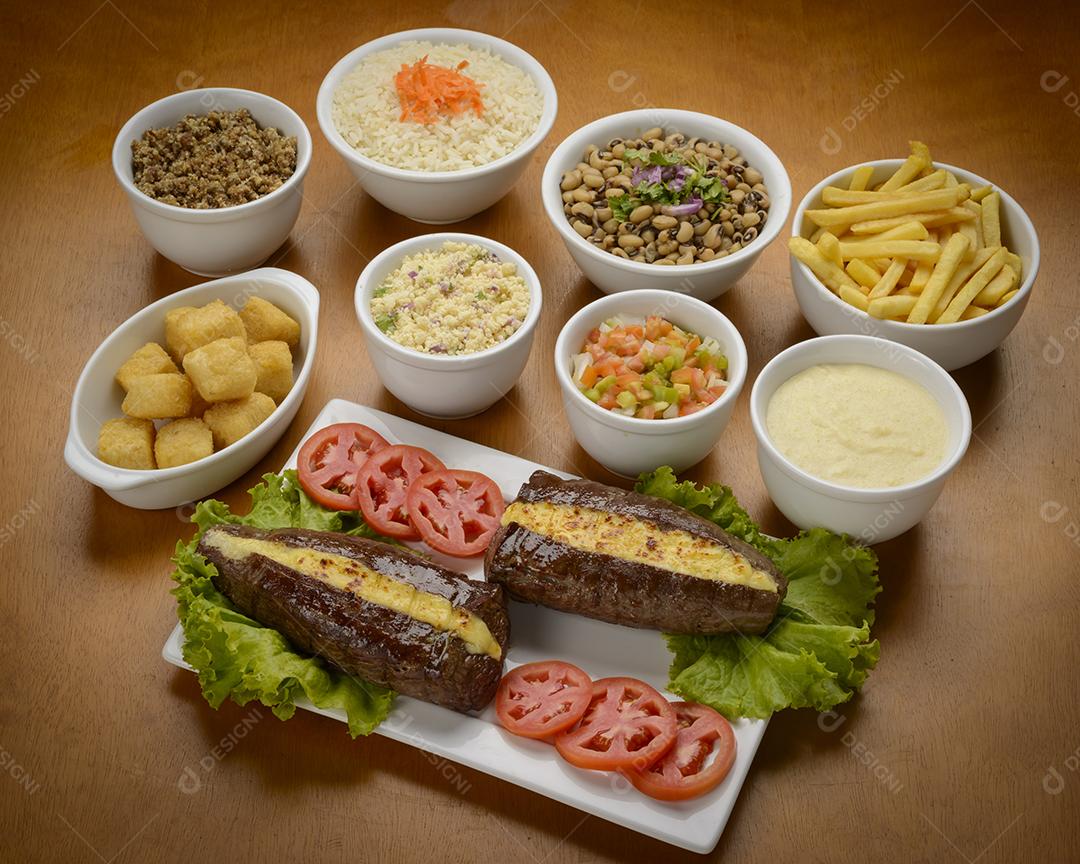 Carne de sol acompanhamentos. Carne de sol, bife salgado, prato típico do nordeste brasileiro.