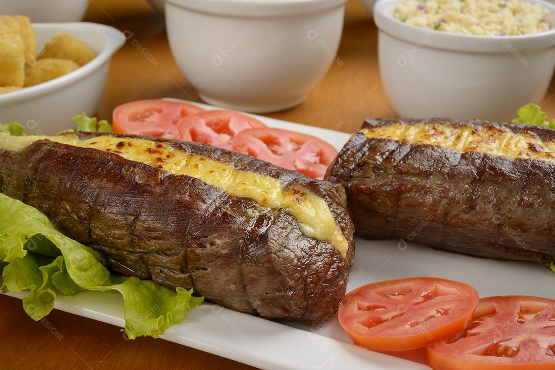 Carne de sol acompanhamentos. Carne de sol, bife salgado, prato típico do nordeste brasileiro.