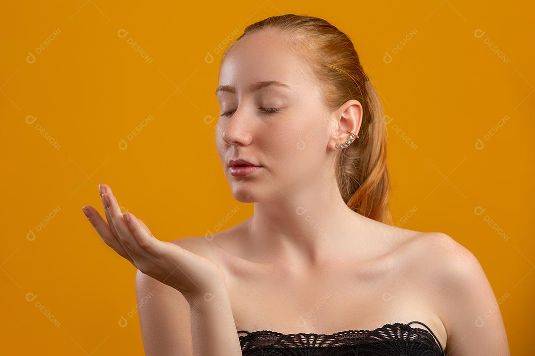 Beautiful redhead. Moisturizing cream or face primer