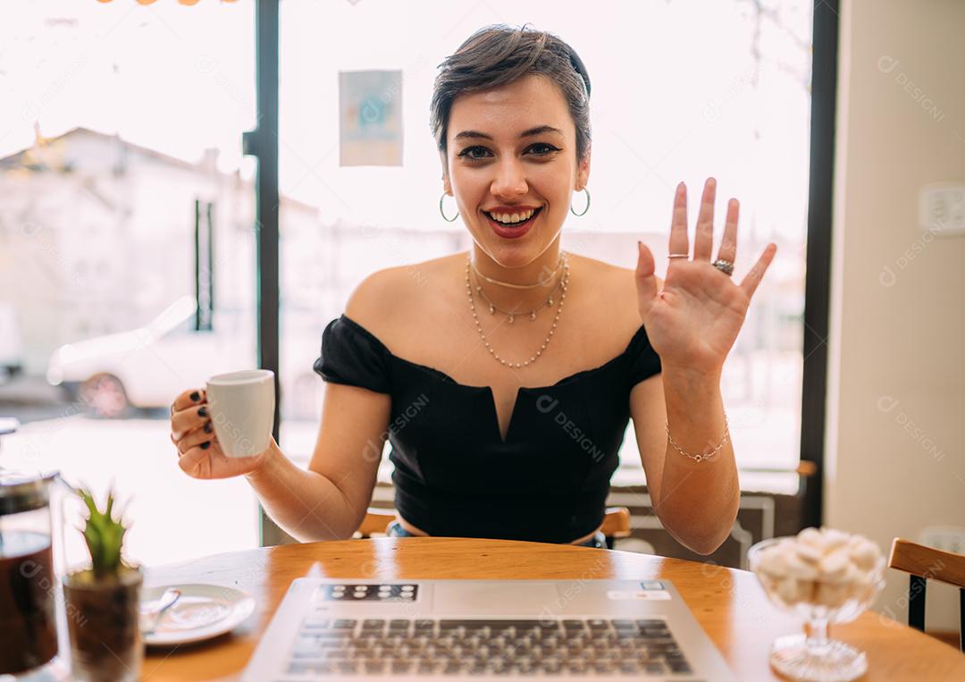 view of smiling millennial woman have nice webcam check