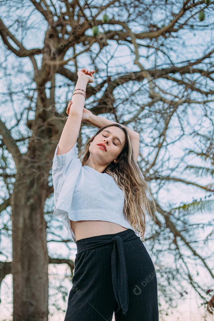 Outdoor portrait of young elegant elegant young latina
