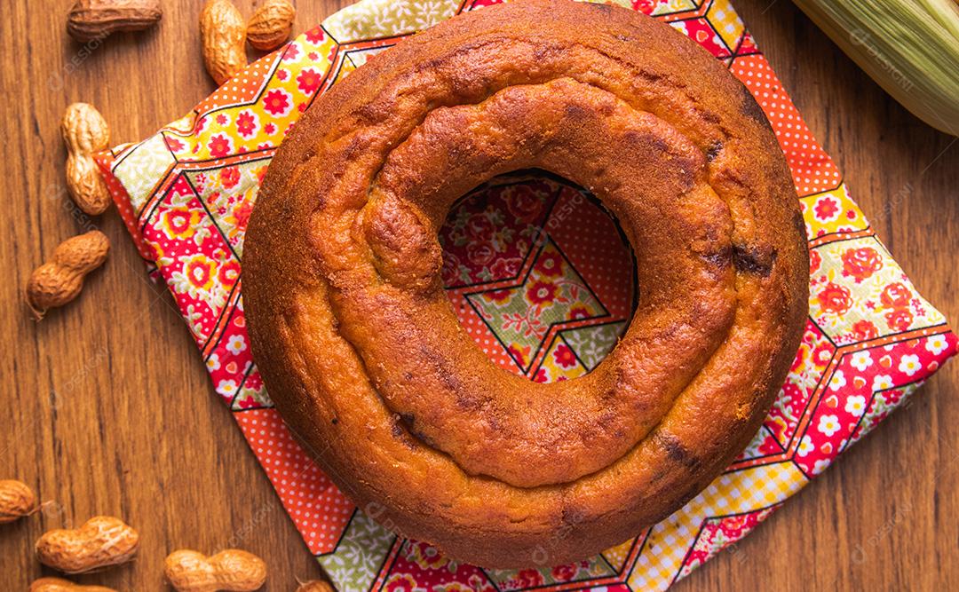 Corn Cake, typical of the Festa Junina. Traditional food from Brazil, sweet from Festa Junina. Arraial Rustic Wooden Background.