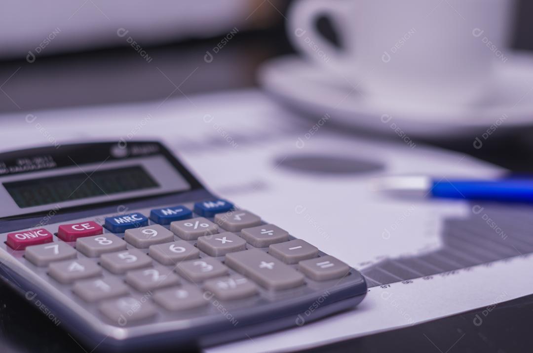 Pen, charts, calculator, finance concept, home economics.