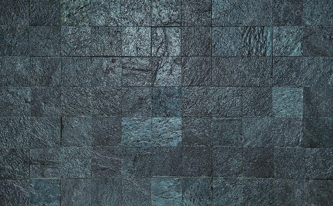 Textura do mosaico de pedras quadradas cinzentas