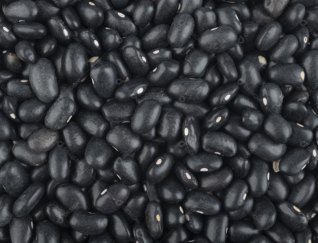 Vista de perto de feijão preto. Pano de fundo alimentar