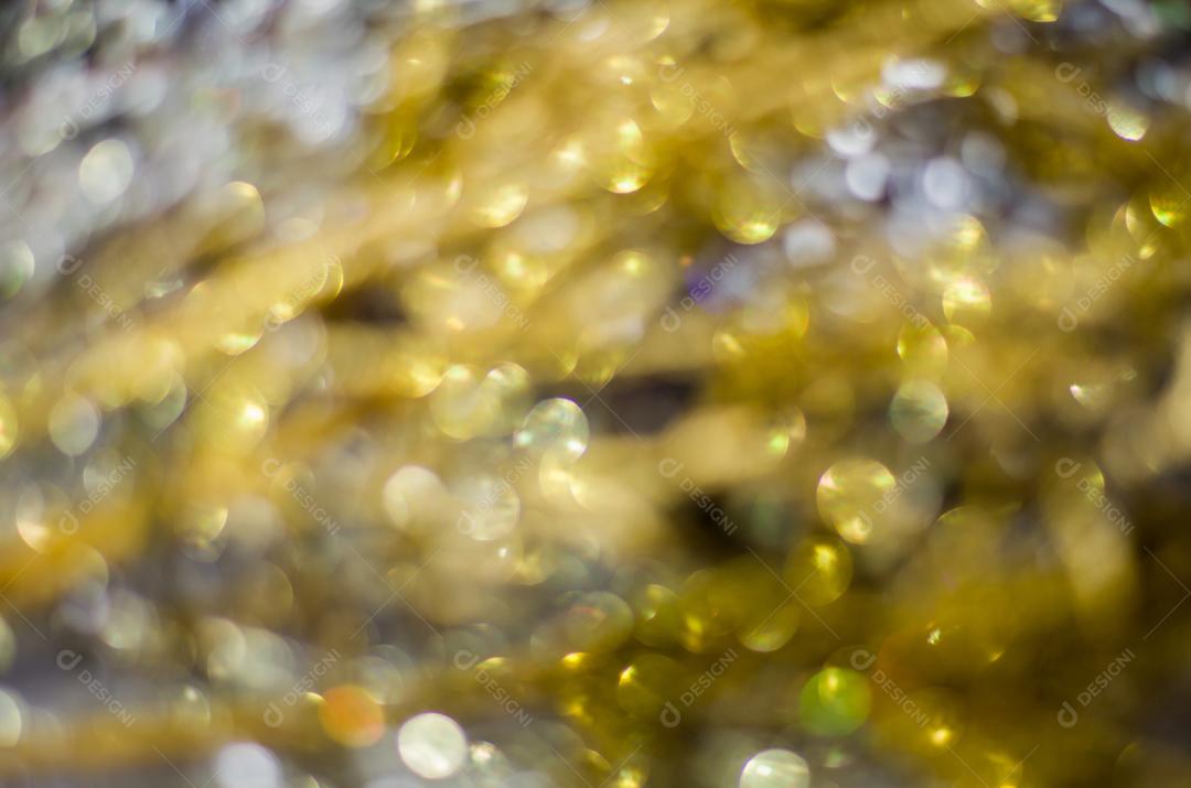 Textura bokeh dourada, textura turva de glitter dourado para planos de fundo.