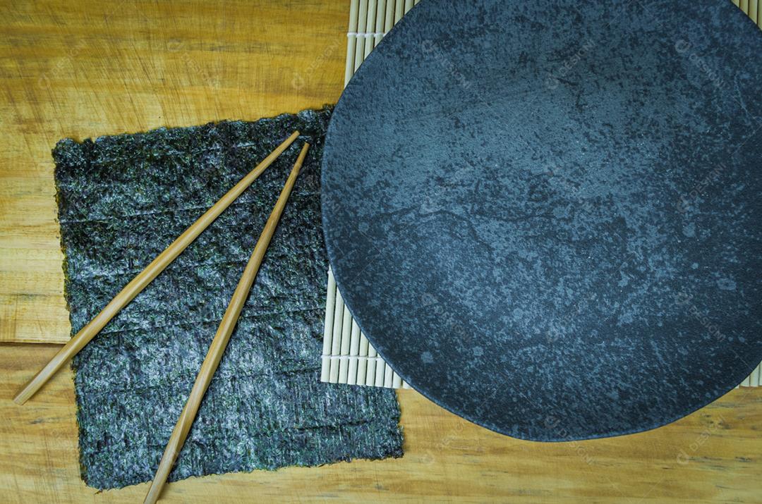 Beautiful background for Japanese food, empty plate seen from above