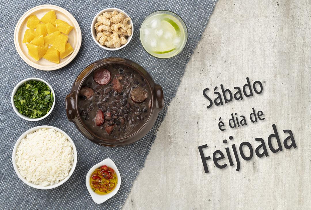 Feijoada tradicional brasileira com arroz, couve, caipirinha. Escrever