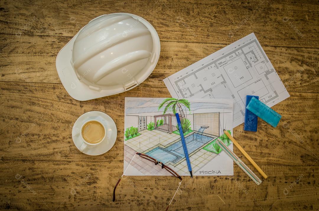 Engenheiro com a planta da casa pronta para ser construida