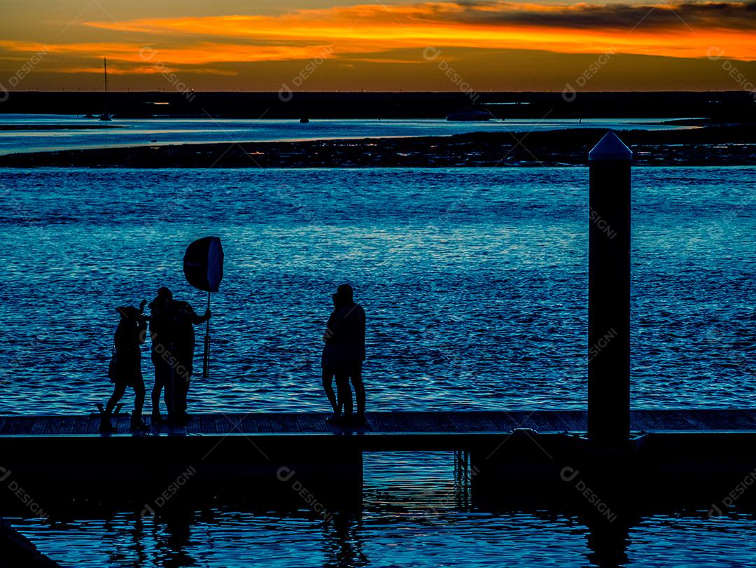 Veleiros na Praia de Faro ao pôr do sol.